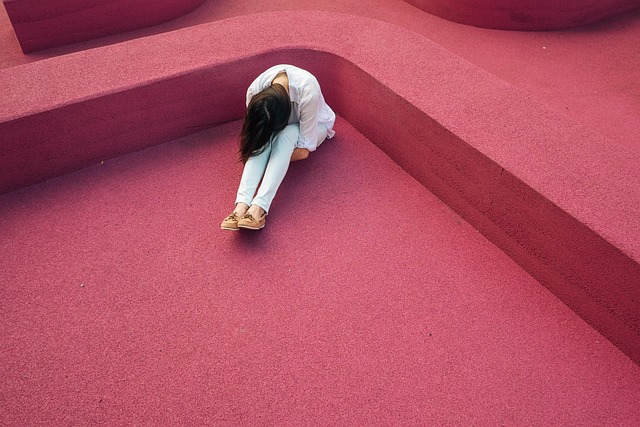 Emotional abuse test, woman curled up