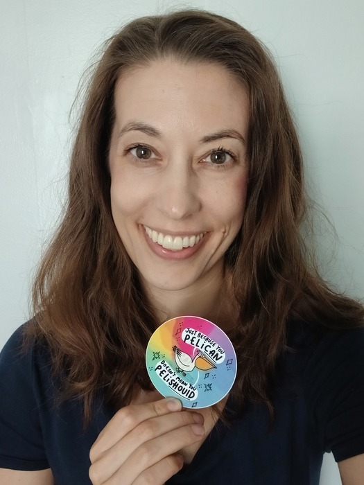 Insecure overachiever, Caroline holding sticker