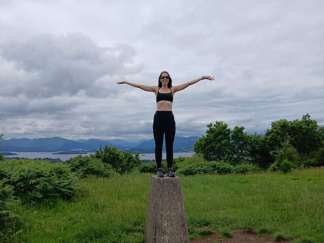 What should I do with my life, Caroline atop hill in Scotland